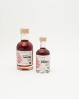 Zirbenschnaps in Glasflasche, Größenvergleich 100ml und 200ml